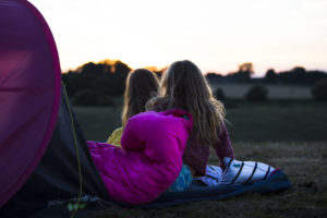 children camping comfortably